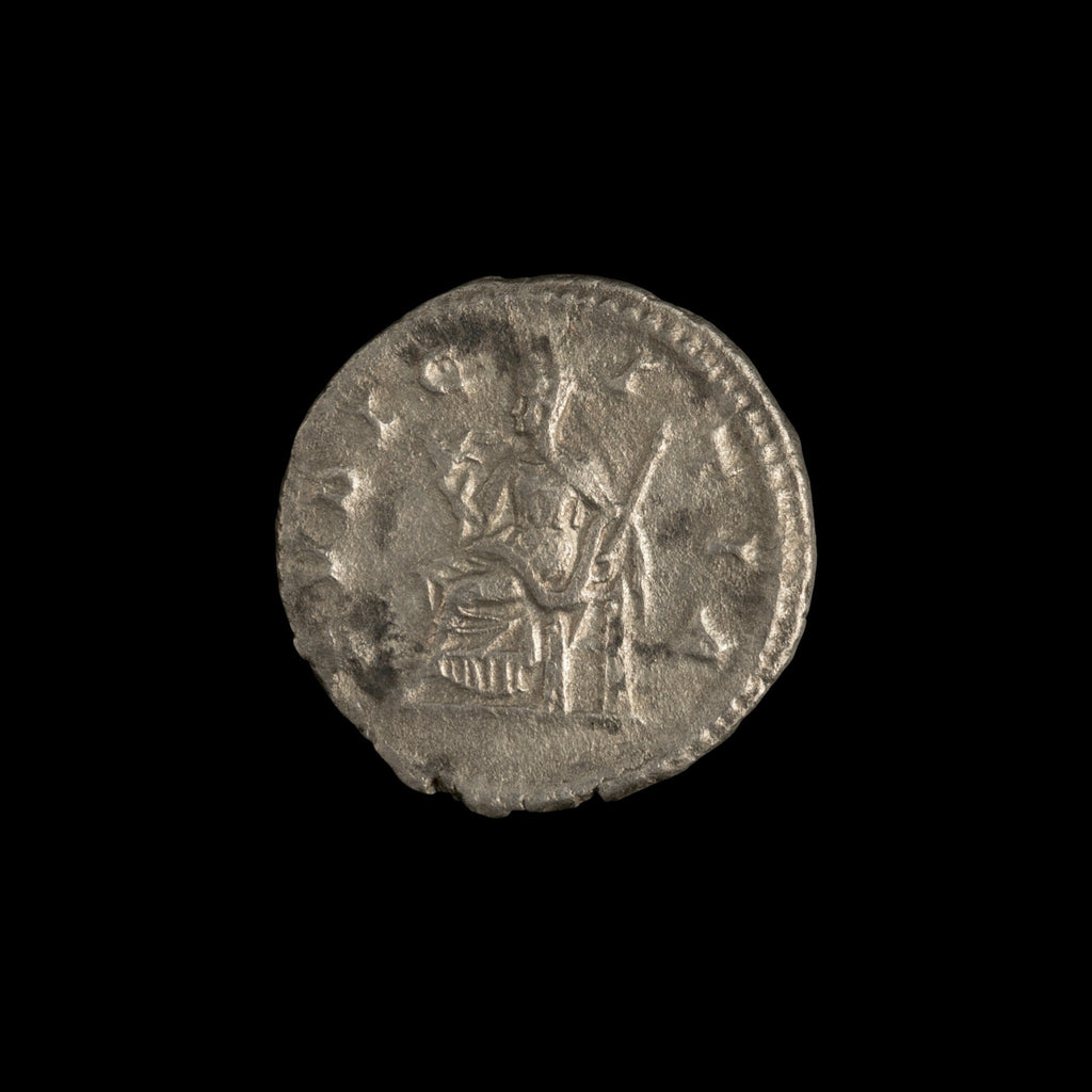 Reverse of Roman silver denarius of Julia Maesa, showing Pudicitia seated left, legend PVDICITIA.