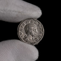 Macro detail of Roman silver denarius of Julia Maesa, portrait close-up.