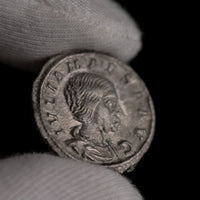 Macro detail of Roman silver denarius of Julia Maesa, portrait close-up.