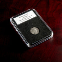 Roman silver denarius of Julia Maesa in protective slab with catalog label.