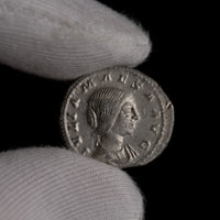 Macro detail of Roman silver denarius of Julia Maesa, portrait close-up.