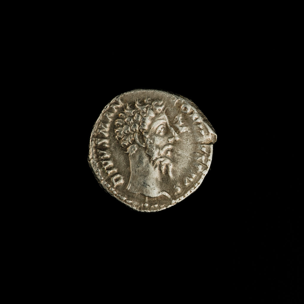 Obverse of Roman silver denarius of Divus Marcus Aurelius (under Commodus), legend DIVVS M ANTONINVS PIVS, radiate or laureate bust right.