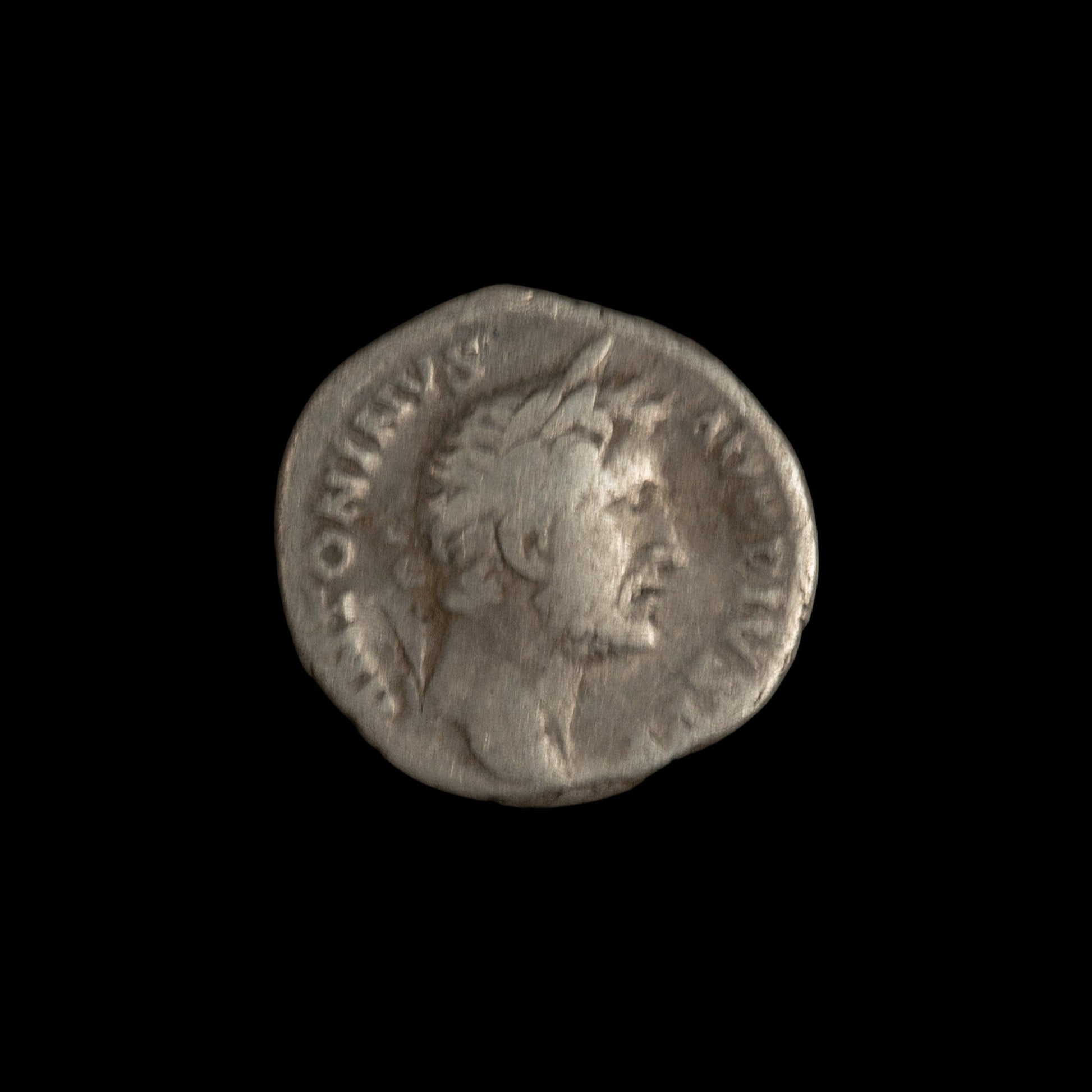 Obverse of Roman silver denarius of Antoninus Pius, legend ANTONINVS AVG PIVS P P, radiate or laureate bust right.