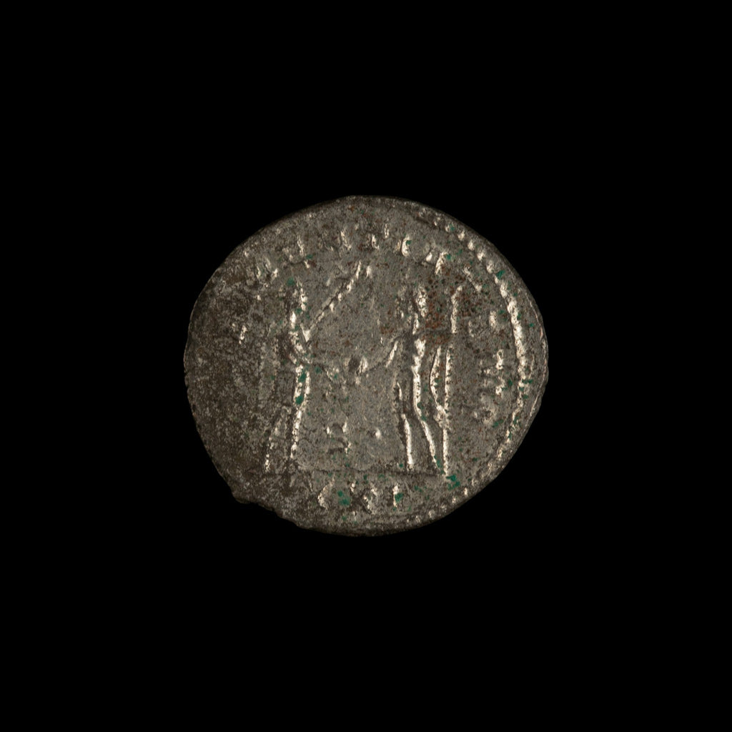 Reverse of Roman silver antoninianus of Probus, showing Probus standing right, legend CLEMENTIA TEMP.