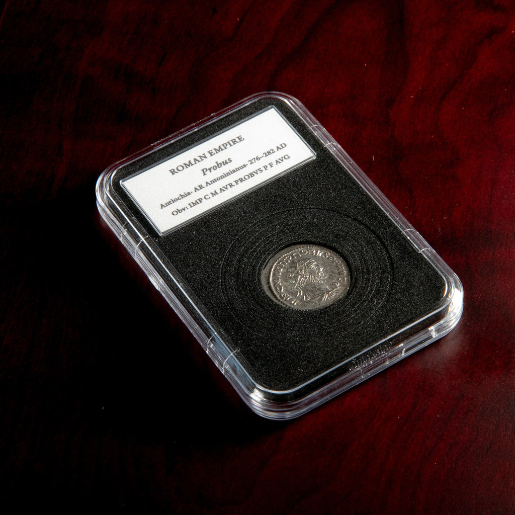Roman silver antoninianus of Probus in protective slab with catalog label.