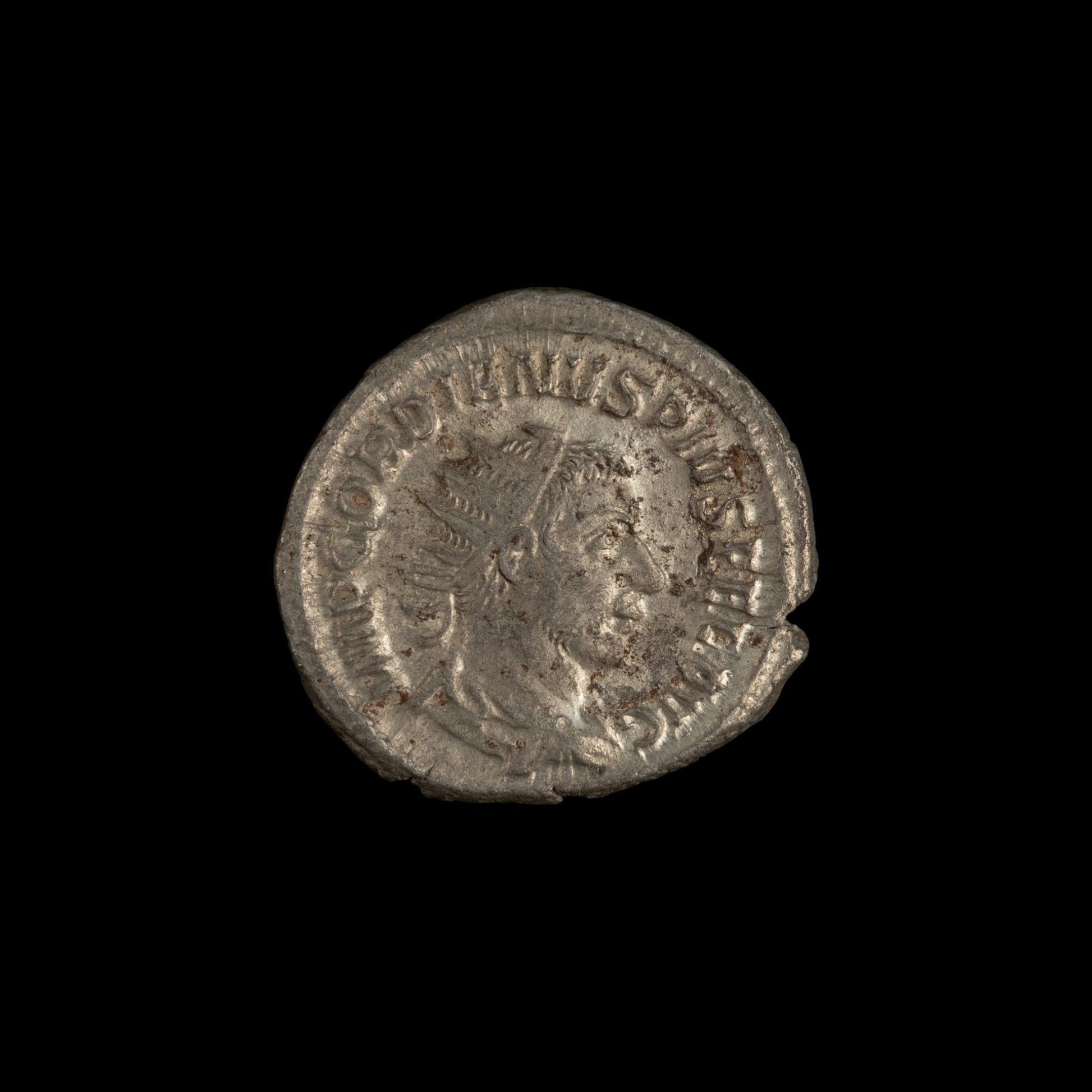 Obverse of Roman silver antoninianus of Gordian III, legend IMP GORDIANVS PIVS FEL AVG, radiate or laureate bust right.