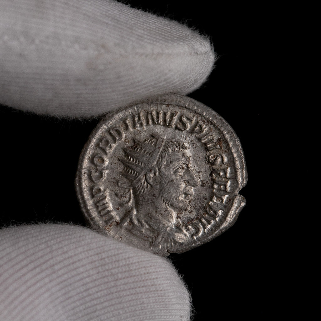 Macro detail of Roman silver antoninianus of Gordian III, portrait close-up.