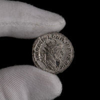 Macro detail of Roman silver antoninianus of Philip II, portrait close-up.