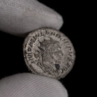 Macro detail of Roman silver antoninianus of Philip II, portrait close-up.