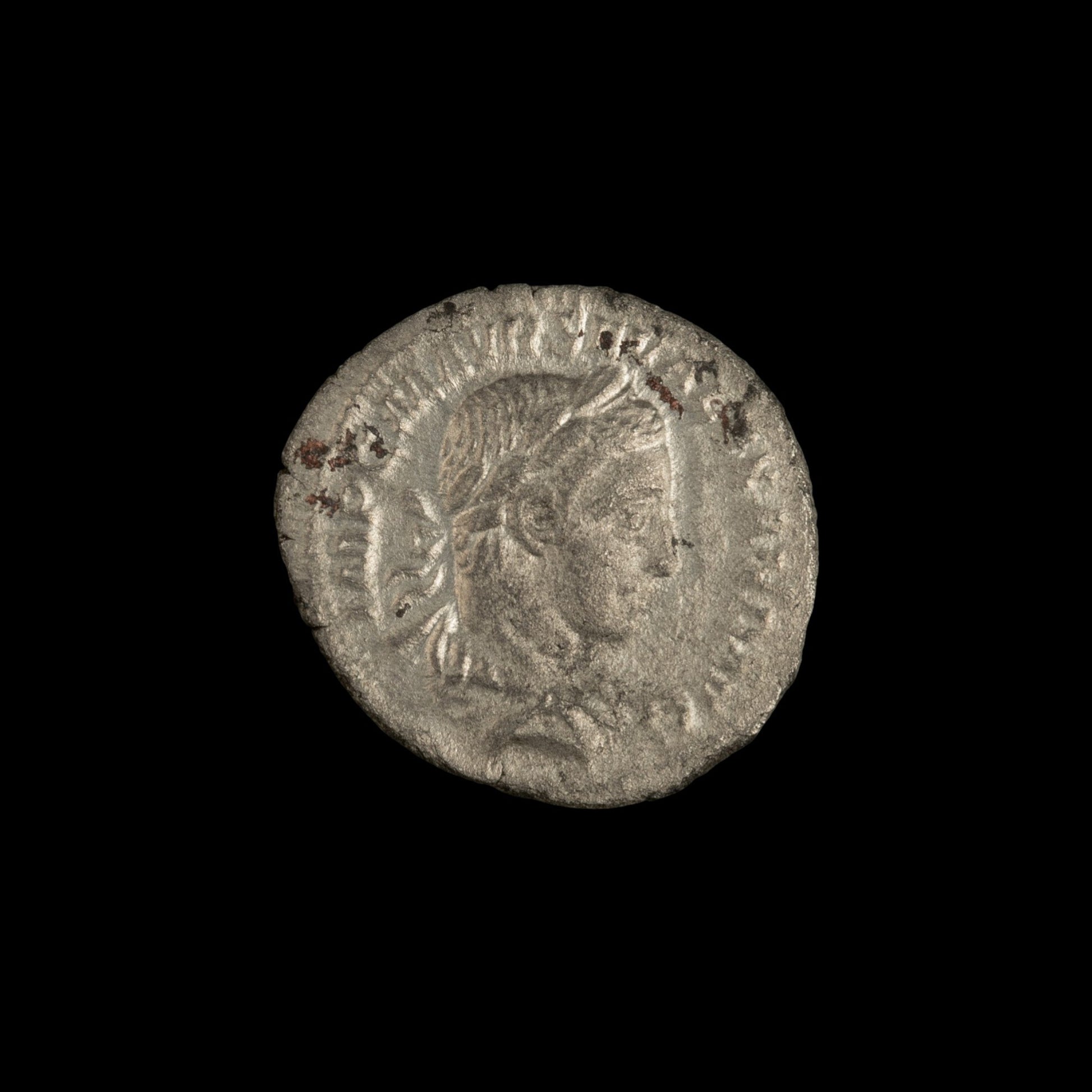 Obverse of Roman silver denarius of Severus Alexander, legend IMP C M AVR SEV ALEXAND AVG, radiate or laureate bust right.