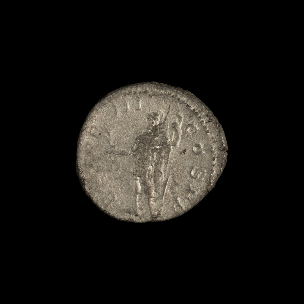 Reverse of Roman silver denarius of Severus Alexander, showing Mars, legend P M TR P III COS P P.