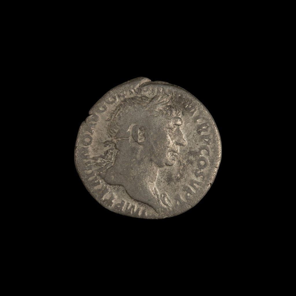 Obverse of Roman silver denarius of Trajan, legend MP TRAIANO AVG GER DAC P M TR P COS V P P, radiate or laureate bust right.