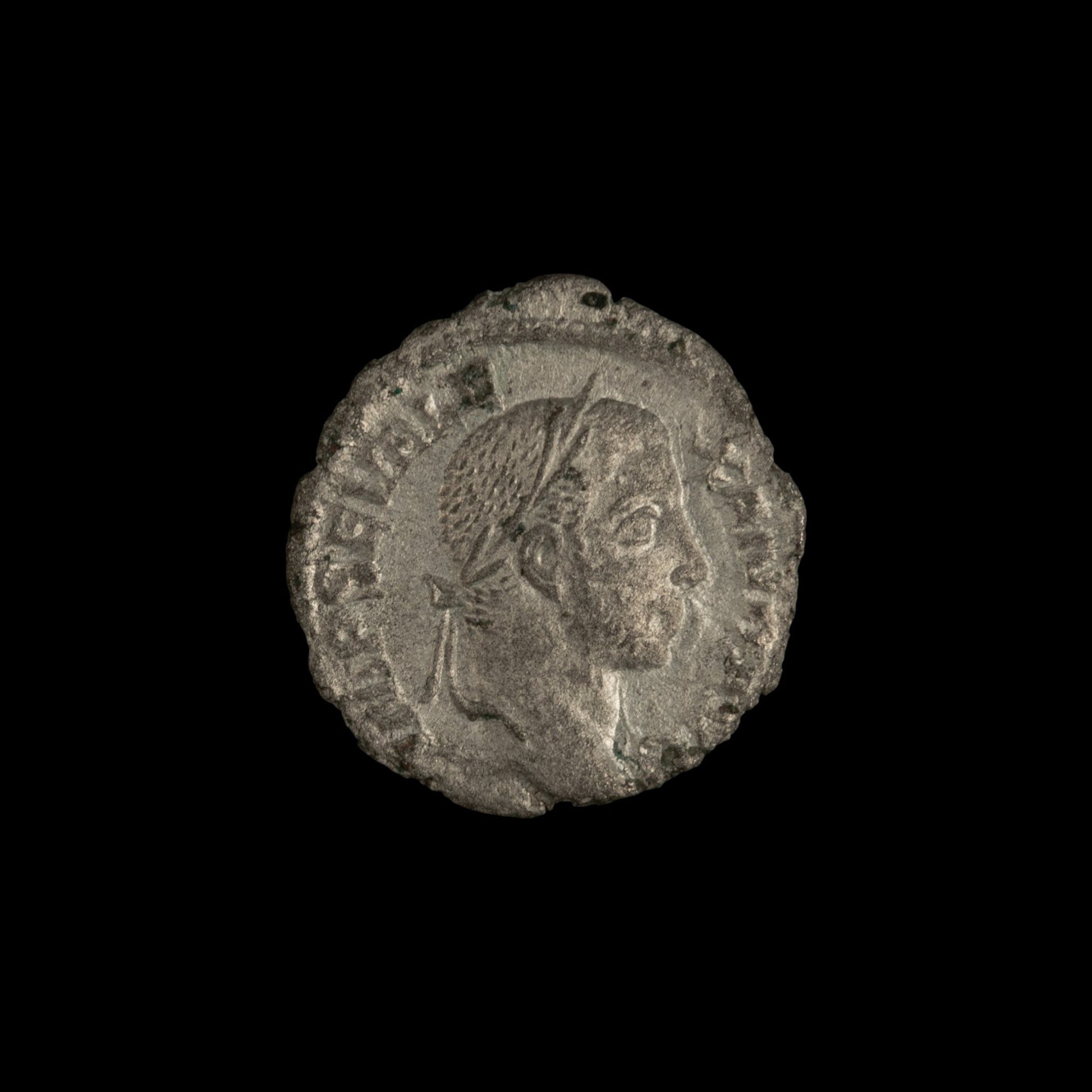 Obverse of Roman silver denarius of Severus Alexander, legend IMP SEV ALEXAND AVG, radiate or laureate bust right.