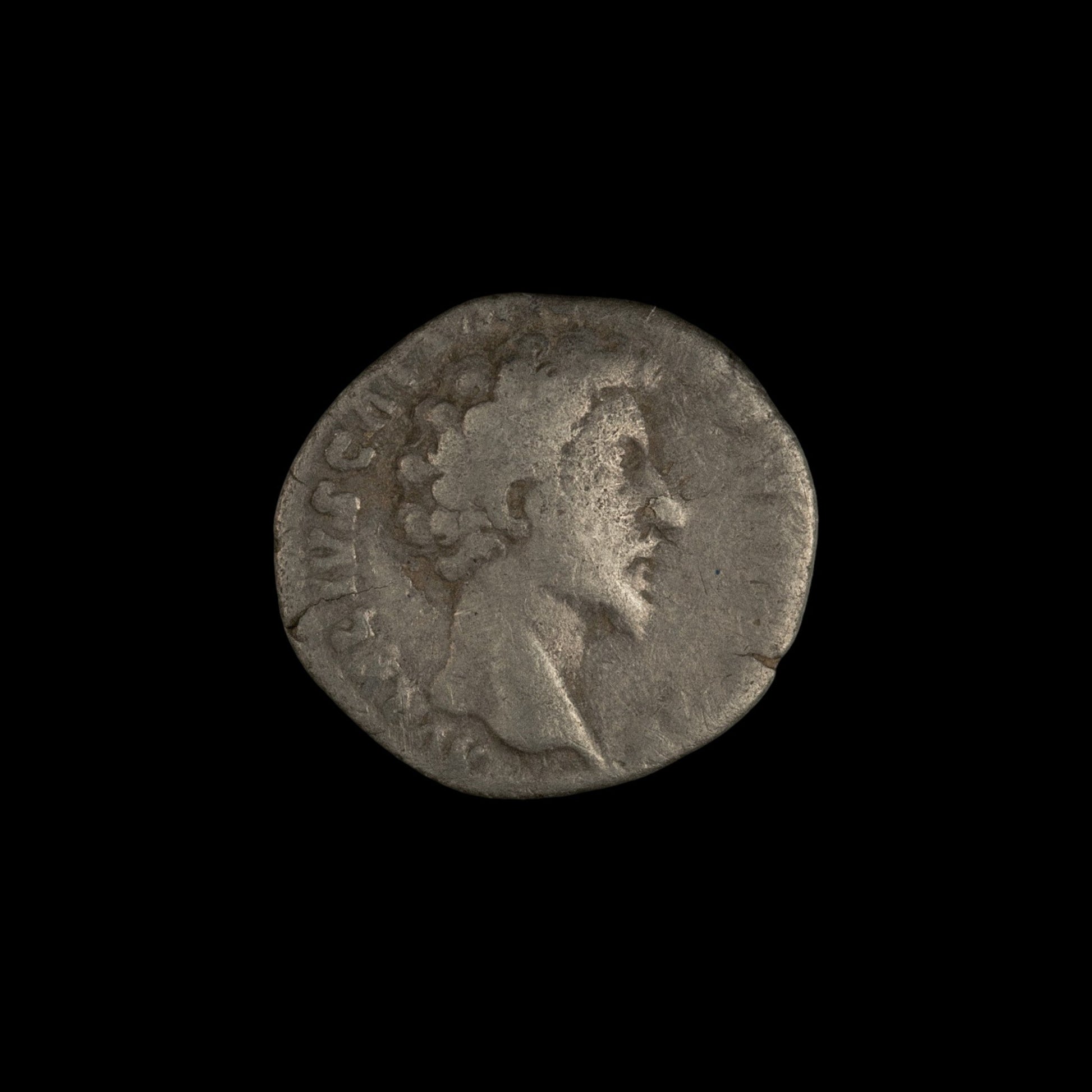 Obverse of Roman silver denarius of Marcus Aurelius (Caesar), legend AVRELIVS CAES ANTON AVG PII F, radiate or laureate bust right.