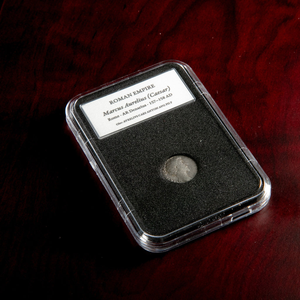 Roman silver denarius of Marcus Aurelius (Caesar) in protective slab with catalog label.