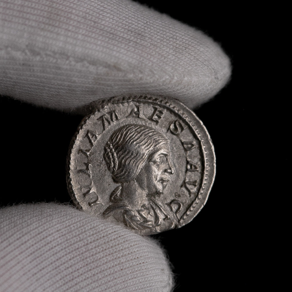 Macro detail of Roman silver denarius of Julia Maesa, portrait close-up.
