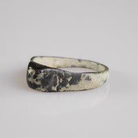 Roman bronze ring Numeria, top-down view of bezel face with possible monogram device