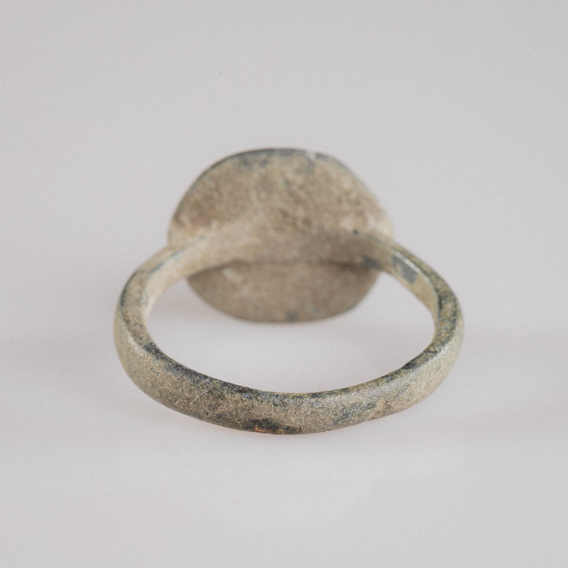 Roman bronze ring Frondis, rear view of tapering hoop and bezel underside with patina