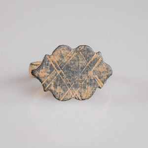 Medieval bronze ring Vladica top view showing polylobed bezel with cross-hatched diamond lattice engraving