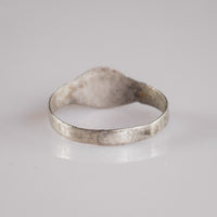 Reverse view of Medieval silver signet ring Aldwin showing thin hand-wrought hoop