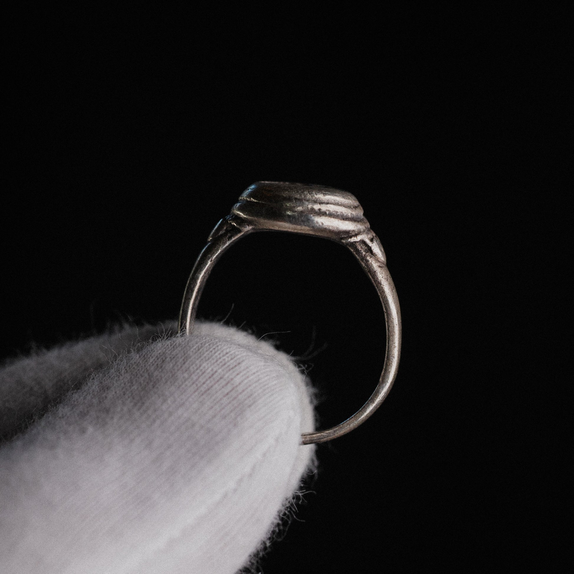 Side profile of Roman silver ring Lavinia showing tapering hoop and stepped bezel collar
