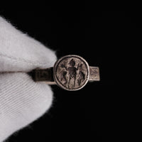 Detail of Byzantine ring Danielos showing figural bezel and compartmentalized hoop panels