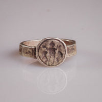 Front view of Byzantine silver ring Danielos with engraved Daniel in the Lions' Den scene