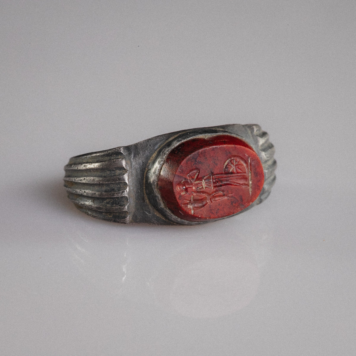 Roman silver ring Fortunata showing engraved Fortuna with cornucopia and wheel of fortune on jasper
