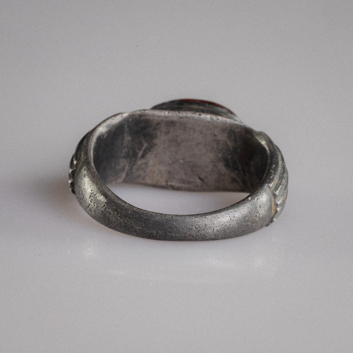 Interior view of Roman silver ring Fortunata showing D-section hoop and natural wear patina