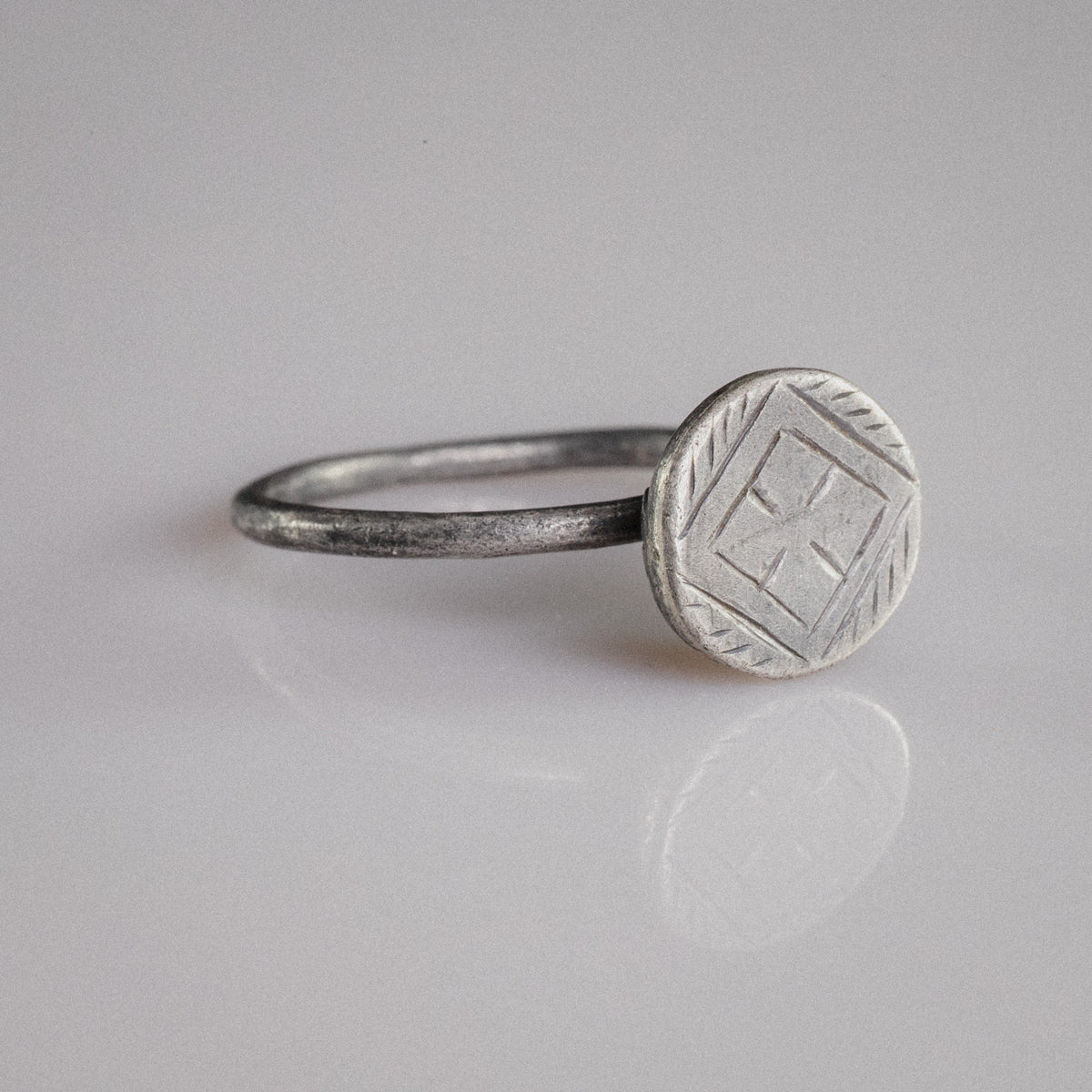 Byzantine silver ring Crucia front view showing herringbone spandrel engraving