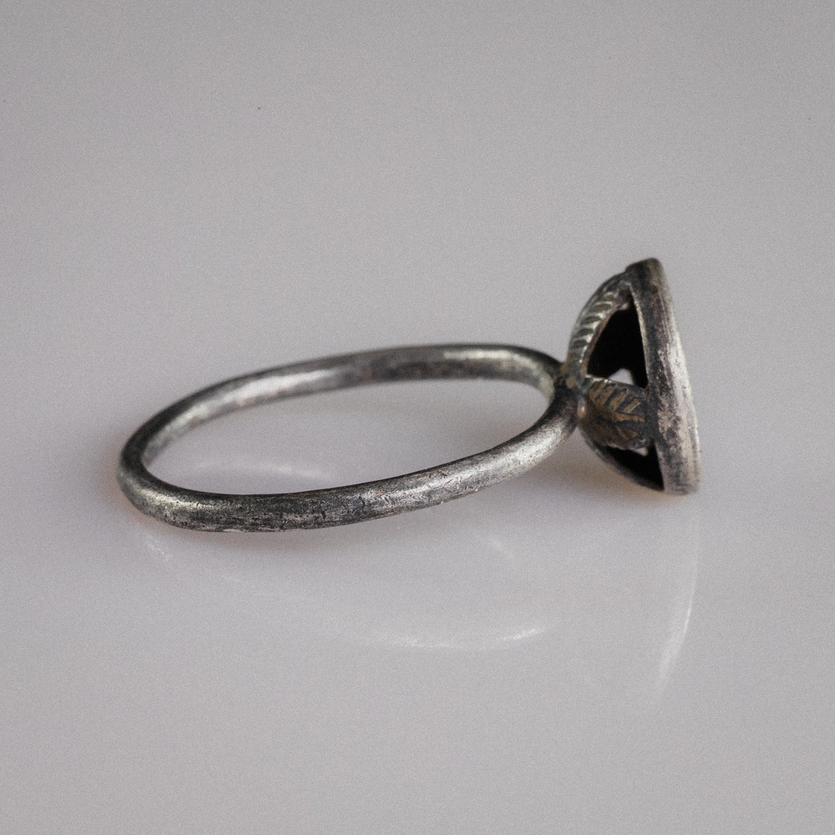 Side profile of Byzantine silver ring Crucia revealing openwork leaf-shaped struts