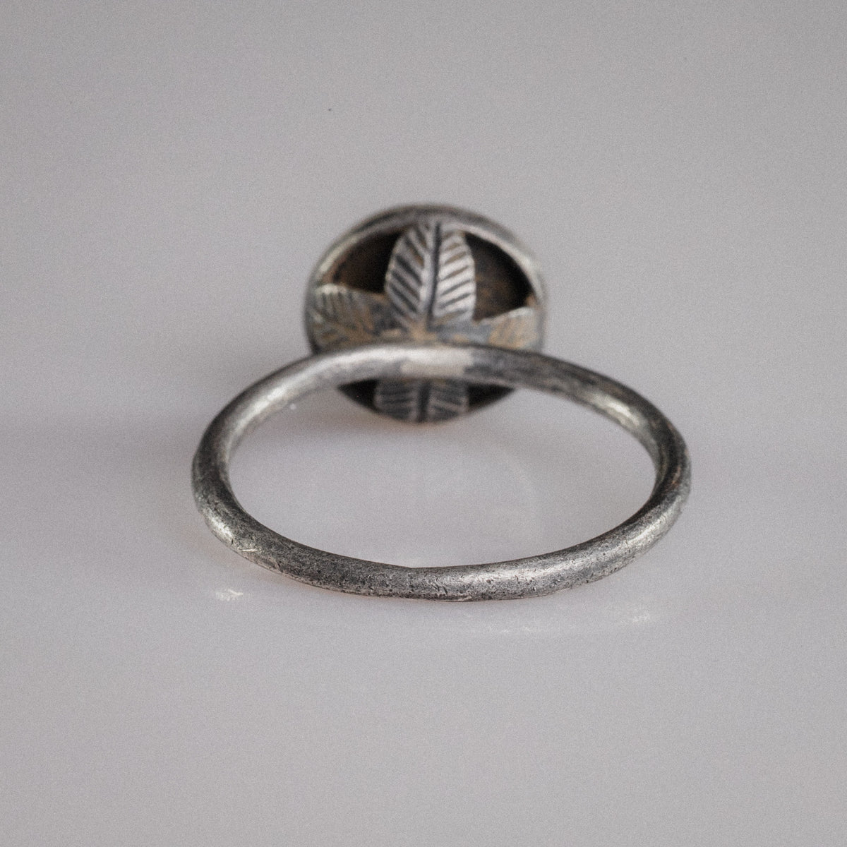 Rear view of Byzantine silver ring Crucia showing engraved underside supports