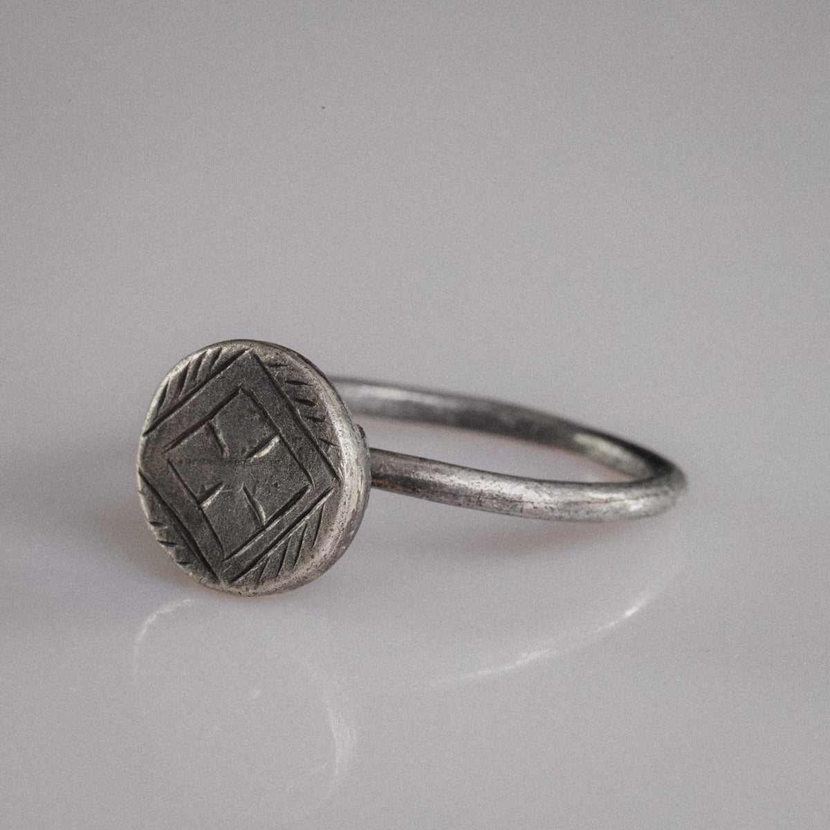 Byzantine silver ring Crucia bezel detail showing cross pattée and lozenge frame