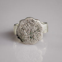 Medieval silver signet ring Florian with sexfoil bezel and engraved star rosette motif
