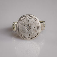 Medieval silver signet ring Stavros with engraved cross-in-circle bezel and scalloped lunate border