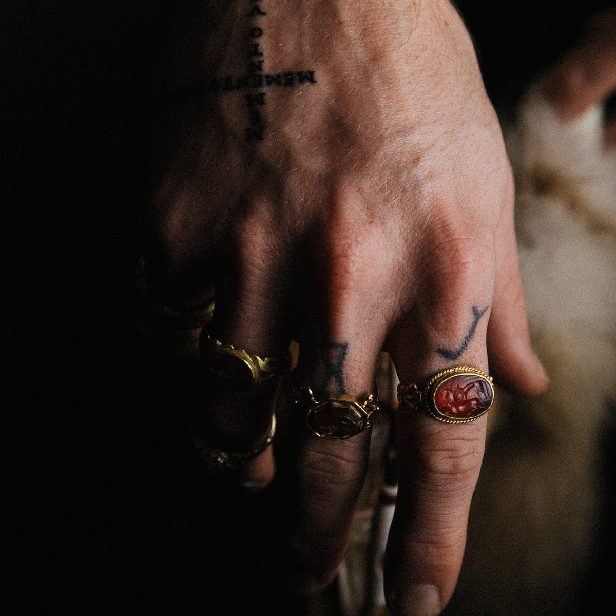 Aurora — Leo et Cervus carnelian intaglio ring worn on hand, lifestyle shot